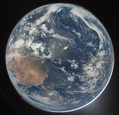The blue sphere that is Earth, with brown and white areas, taken by Artemis 2 astronauts